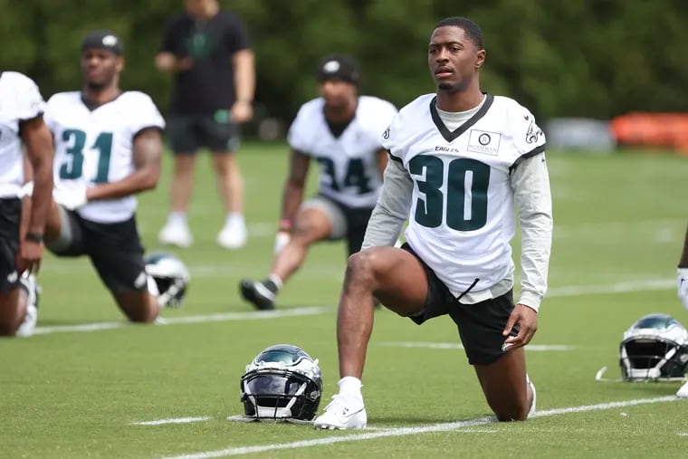 Eagles rookie and first round draft pick Quinyon Mitchell, cornerback out of Toledo, warms up during rookie minicamp at the NovaCare Complex in Philadelphia on Friday, May 3, 2024.