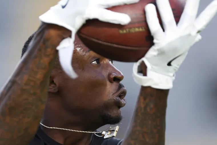Eagles’ Alshon Jeffery,  nursing a shoulder injury,  catches a pass before preseason game against Packers. He did not play.
