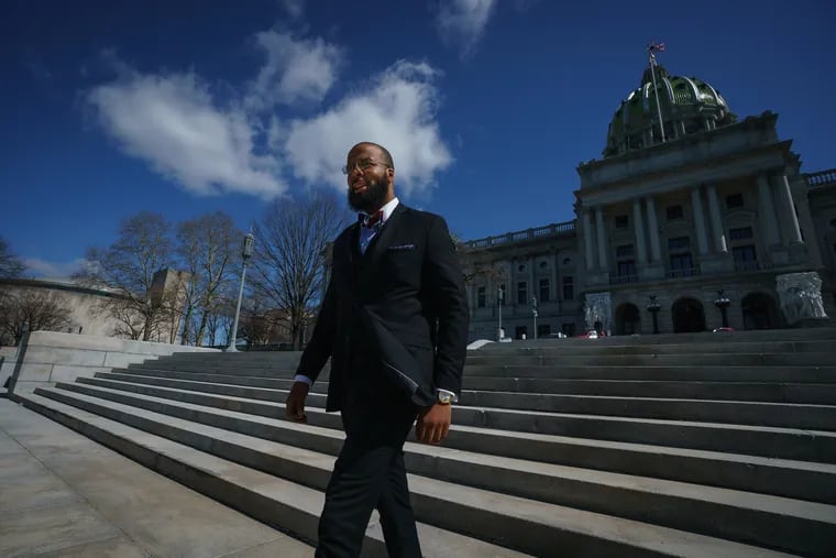 Brandon Flood, the new secretary of the state Board of Pardons, shown here in front of the Capital Building in Harrisburg, PA, April 1, 2019. Flood is a former inmate.