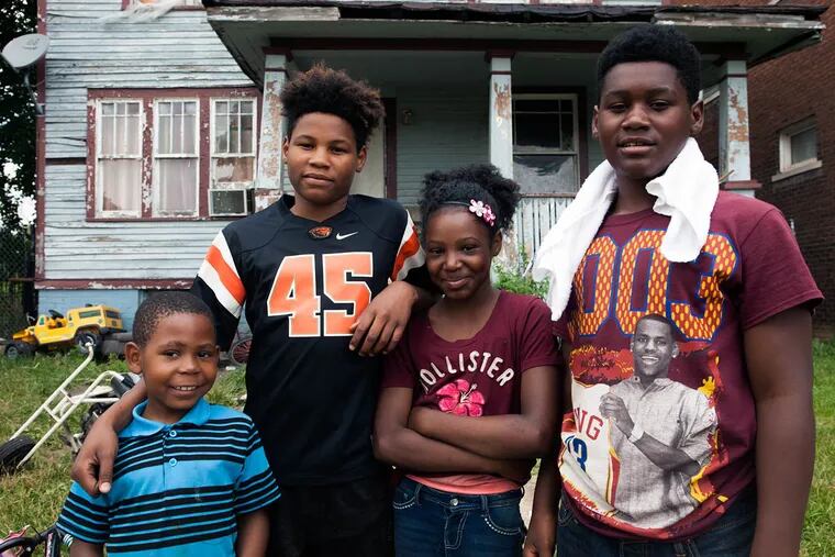 Lashanda Mayberry's children attended a charter school, one of the few schools left in Highland Park, Mich. From right are Tazeon, 15; Myaira, 11; and Keon, 13, with Mayberry's nephew Armani, 7.