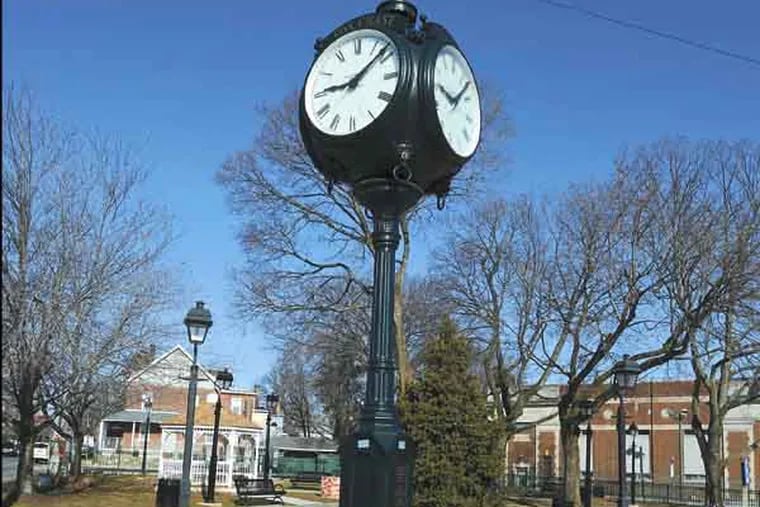 The clock tower in the center of Fox Chase around the SEPTA Loop in Fox Chase. ( RON TARVER / Staff Photographer )