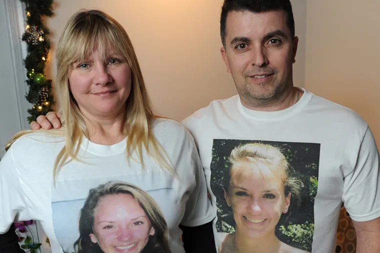 Donna and Steve Gallo, wearing t-shirts of their daughter Nicole, who died after being struck by a driver under the influence more than four years ago. Nicole was 19-years-old at the time. Portrait taken Jan. 28, 2014 at the Gallo home. (CLEM MURRAY/Staff Photographer)