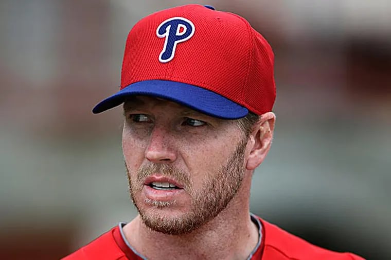 Roy Halladay is as optimistic as ever that he will pitch in 2013. (Matt Slocum/AP)