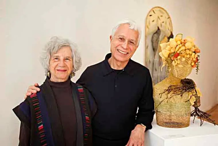 Ruth and Rick Snyderman in their Old City gallery on Thursday March 14th. Ruth is being honored by the Clay Studio for her work. ( ED HILLE / Staff Photographer )