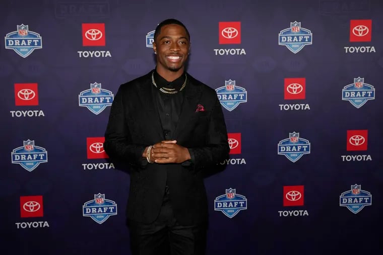 Toledo cornerback Quinyon Mitchell poses on the red carpet ahead of the first round of the NFL draft.