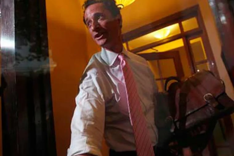 Rep. Anthony Weiner, D-N.Y., closes the front door of his building on reporters as he arrives at his house in the Queens borough of New York, Thursday, (AP Photo/Mary Altaffer)