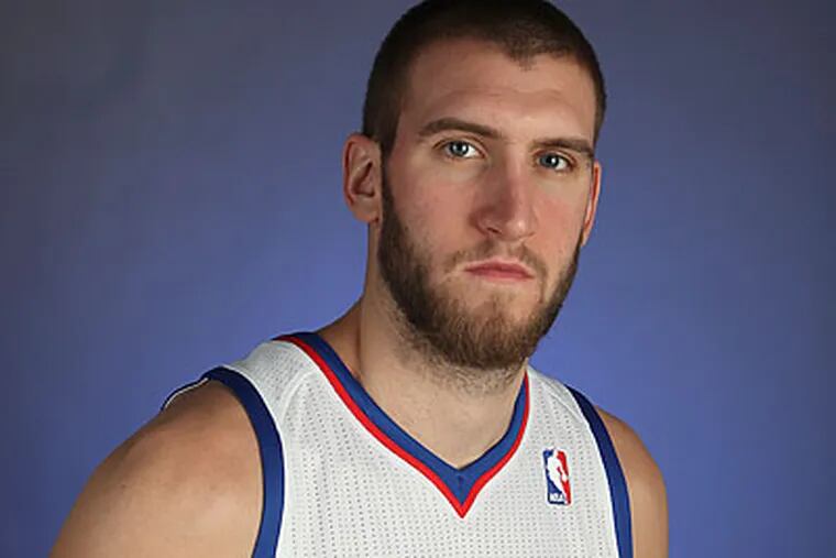 Spencer Hawes is averaging 12 points, 12.5 rebounds and 4.0 assists per game so far this season. (Steven M. Falk/Staff file photo)