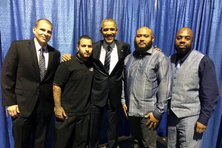 “I got a little choked up,” Jeffrey Copeland (left) said of President Obama’s telling his story in his speech to the NAACP convention. The president (center) posed with Copeland and other ex-offenders (from left) Juan (no last name available), El Sawyer, and Rob Warren. (Courtesy of Jeffrey Copeland)