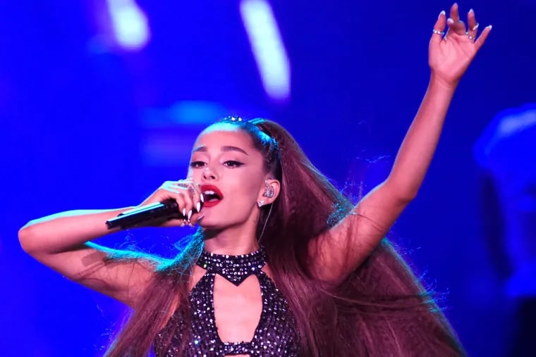 FILE - In this June 2, 2018 file photo, Ariana Grande performs at Wango Tango at Banc of California Stadium in Los Angeles. Her 'Sweetener' tour comes to the Wells Fargo Center on Tuesday. (Photo by Chris Pizzello/Invision/AP, File)