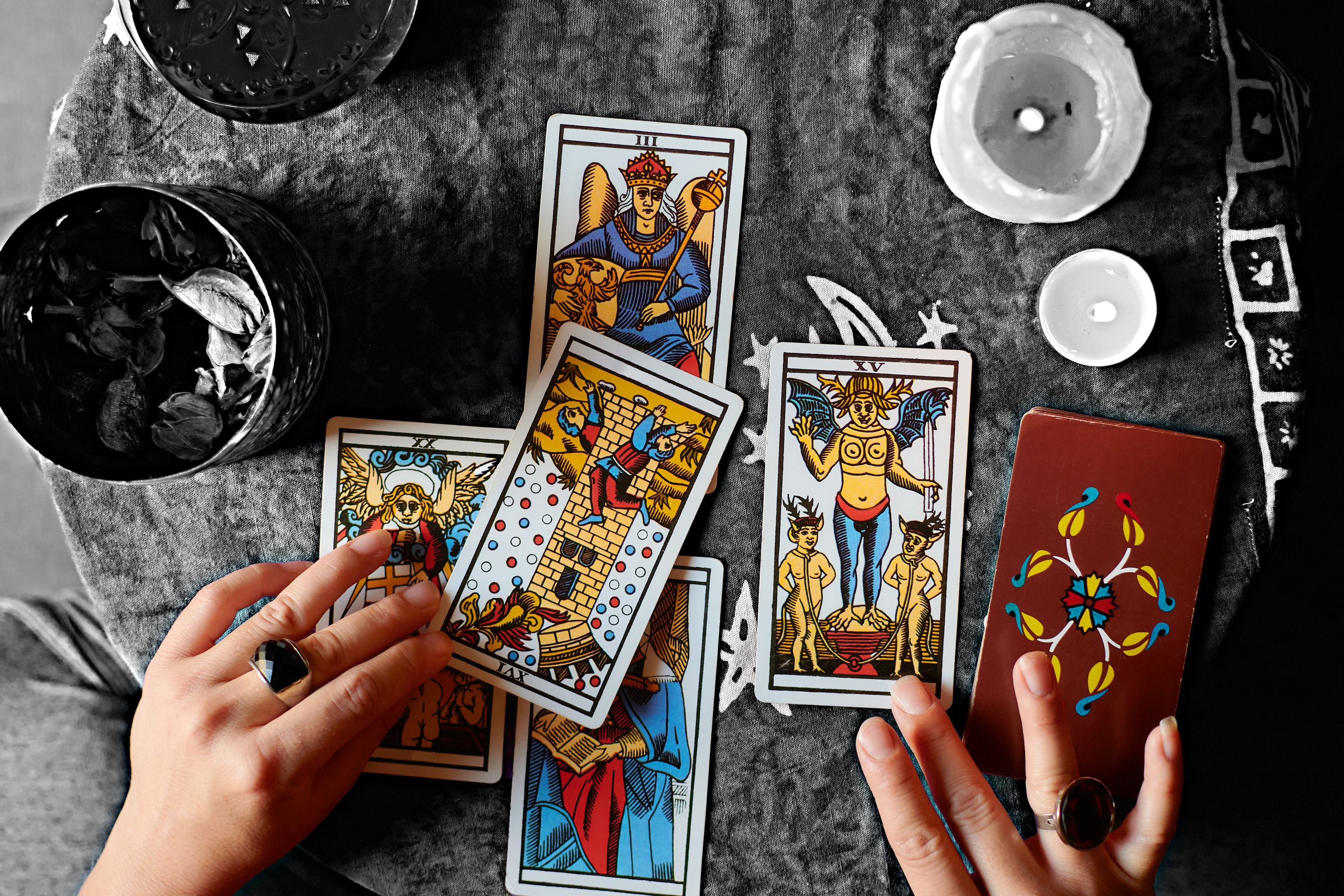 Professional tarot card reading setup with candles and crystals for authentic spiritual sessions