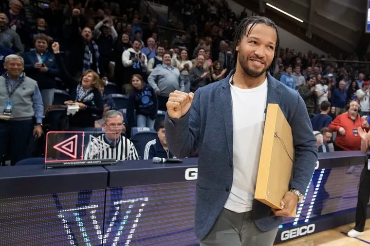 At halftime of the game between Villanova and DePaul, Villanova retired the number of Jalen Brunson on Feb. 8, 2023 at the Finneran Pavilion at Villanova University. Brunson pumps his fist after wishing the Eagles good luck in the Super Bowl.