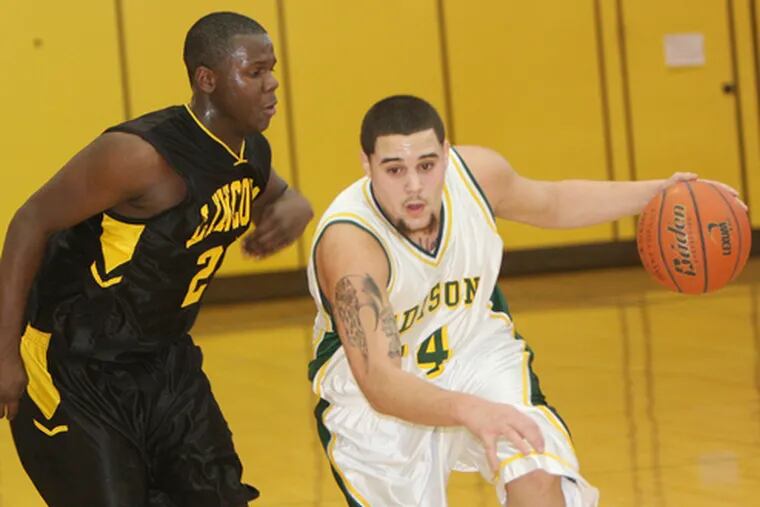 Edison&#0039;s Luis Martinez drives by Lincoln&#0039;s Rasaan Hanner.