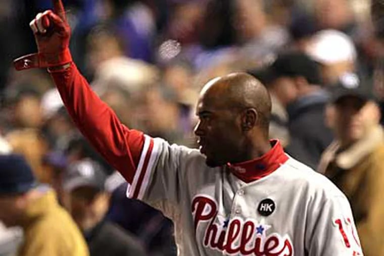 Jimmy Rollins extension guarantees that he will be here until at least 2011. (Yong Kim/Staff Photographer)