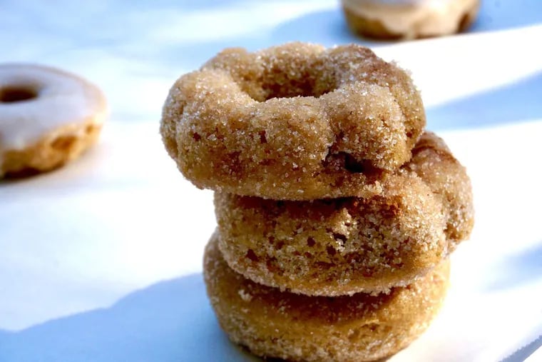 A stack of baked apple cider doughnuts