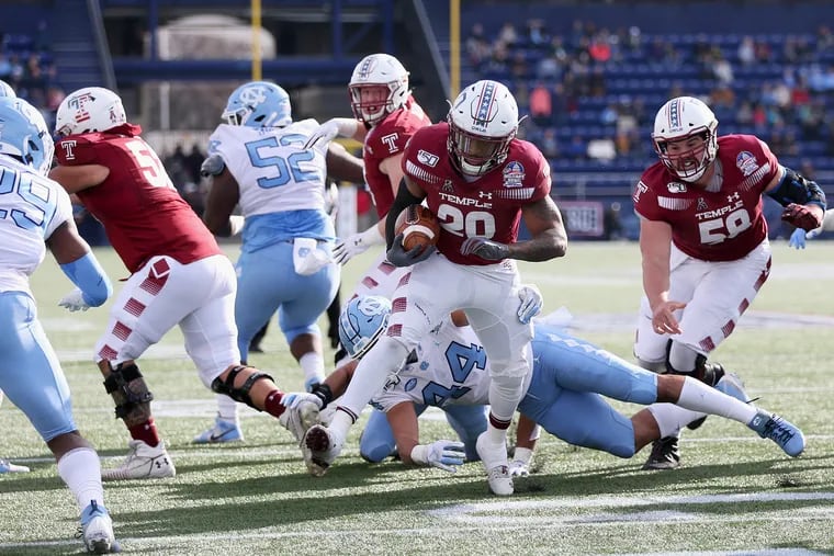 Temple running back Re'Mahn Davis  gets past North Carolina linebacker Jeremiah Gemmel (44) to score a touchdown in the second quarter of the Military Bowl at Navy-Marine Corps Memorial Stadium in Annapolis, Md., on Friday, Dec. 27, 2019.