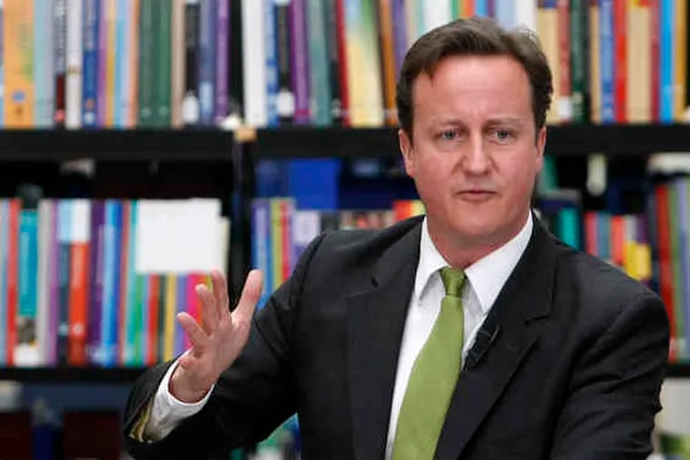 Britain's Prime Minister David Cameron discusses spending cutbacks. He said the pain of cutting Britain's national deficit was worse than previously feared. He is to announce the cuts June 22.
