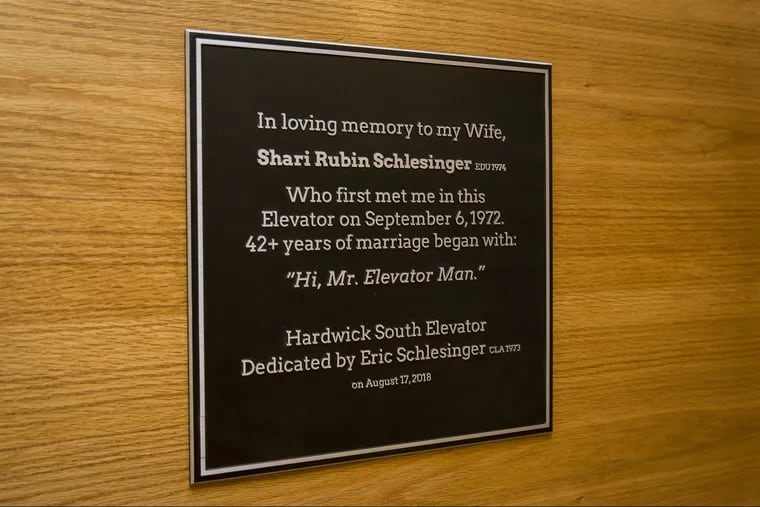 A plaque hangs outside the Temple University elevator where Shari Rubin Schlesinger first saw Eric in 1972 and love later bloomed.
