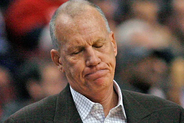 Philadelphia 76ers coach Doug Collins reacts to his team's play against the San Antonio Spurs in the first half of an NBA basketball game Monday, Jan. 21, 2013, in Philadelphia. (H. Rumph Jr/ AP)