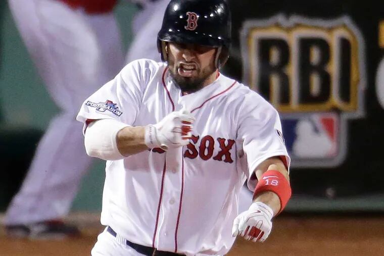 Victorino's slam lifts Red Sox to World Series