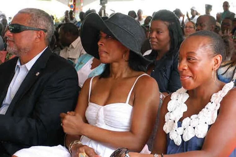 Actresses Angela Bassett (center) and Marianne Jean-Baptiste with tourism minister John Maginley at the August renaming ceremony in St. John's, Antigua.