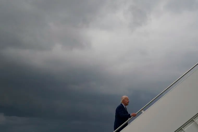 President Joe Biden boards Air Force One Sunday after attending the Association of Southeast Asian Nations summit in Phnom Penh, Cambodia.