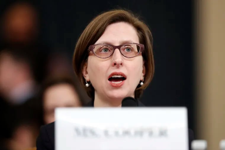 Deputy Assistant Secretary of Defense Laura Cooper testifies Wednesday before the House Intelligence Committee on Capitol Hill in Washington during a public impeachment hearing of President Donald Trump.