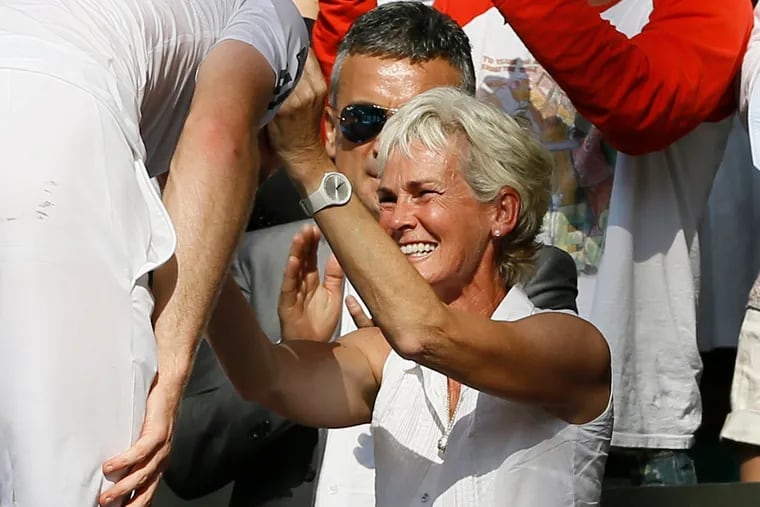 Judy Murray greets her son, Andy, after Andy won Wimbledon in 2013.