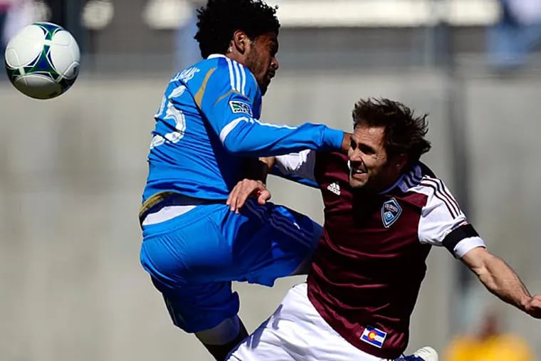 Colorado Rapids' Brian Mullan (11) and Philadelphia Union's Sheanon
Williams (25) collide as they battle for a high ball during the first half of a MLS soccer game at Dick's Sporting Goods Park. Saturday, March 10, 2013, in Commerce City, Colo. (AAron Ontiveroz/AP, The Denver Post)