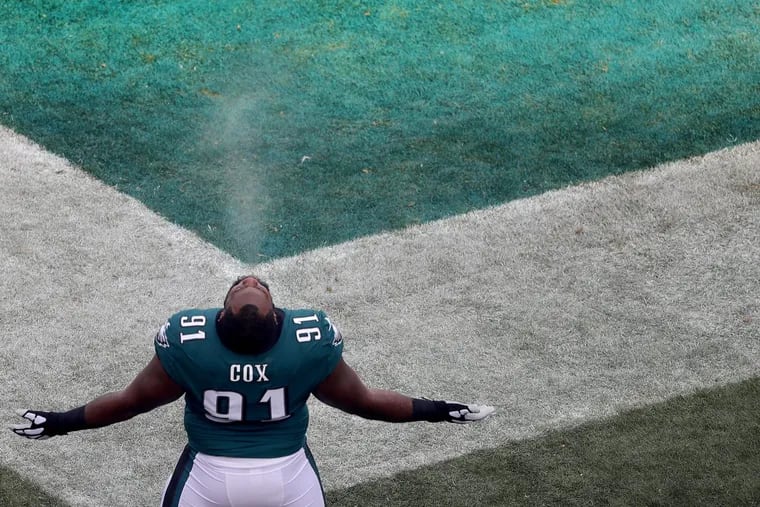 Eagles’ Fletcher Cox spits water out as he is introduced before the Philadelphia Eagles play the Chicago Bears in Philadelphia, PA on November 26, 2017.