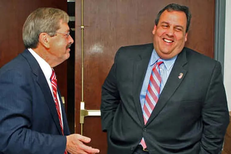 Gov. Christie after appearing with Iowa GOP gubernatorial candidate Terry Branstad (left). Rising-star politicians like Christie don't go to Iowa for tourism, said one political analyst. (BILL NEIBERGALL)