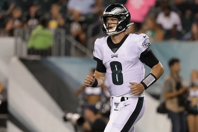 Eagles quarterback Clayton Thorson jogs off the field after after a drive stalled in the 4th quarter against the Tennessee Titans in a preseason game in Philadelphia, PA on August 8, 2019.