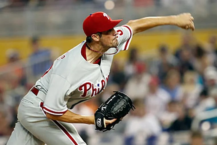 "A lot of these rumors are product of the timing and way we're playing," Ruben Amaro said of Cole Hamels trade rumors. (Terry Renna/AP)