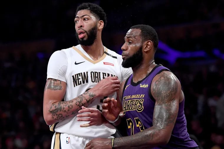 LeBron James (right) and Anthony Davis are both represented by Rich Paul, who doesn't have a college degree -- one of the NCAA's new requirements.