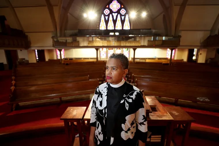 Leslie D. Callahan, pastor of St. Paul's Baptist Church, poses for a portrait, at her church in North Philadelphia on April 8, 2020.