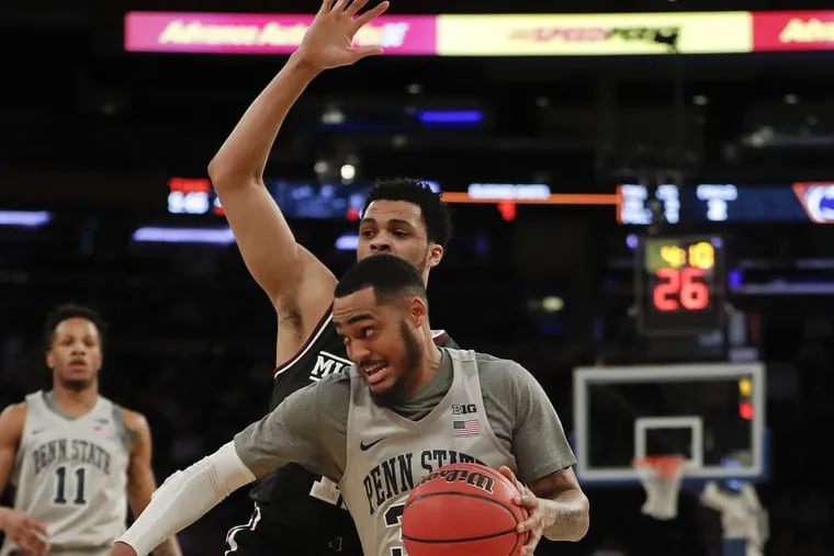 Penn State guard Shep Garner (33) drives against Mississippi State guard Quinndary Weatherspoon during tthe first half of an NCAA college basketball game during the semifinals of the NIT, Tuesday, March 27, 2018, in New York. (AP Photo/Julie Jacobson)