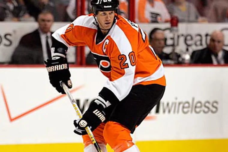 Flyers captain Chris Pronger has missed the last two games because of a virus. (Tom Mihalek/AP)