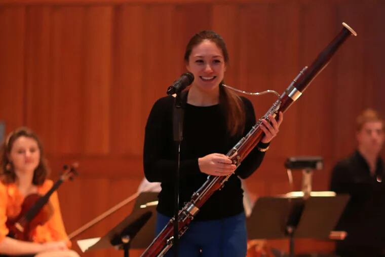 Bassoonist Emeline Chong with her instrument.