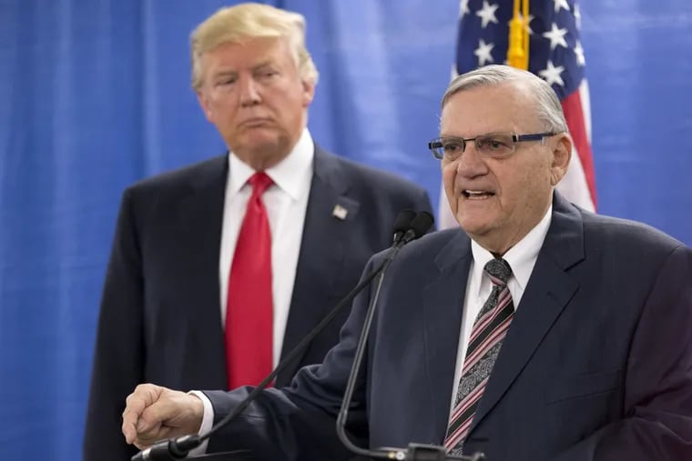 As a presidential candidate, Donald Trump appeared with then-Sheriff Joe Arpaio in Iowa in January 2016.