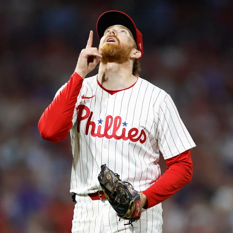 Phillies pitcher Spencer Turnbull points after completing the sixth inning.