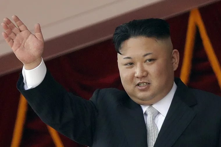 North Korean leader Kim Jong Un waves during a military parade in Pyongyang, North Korea.