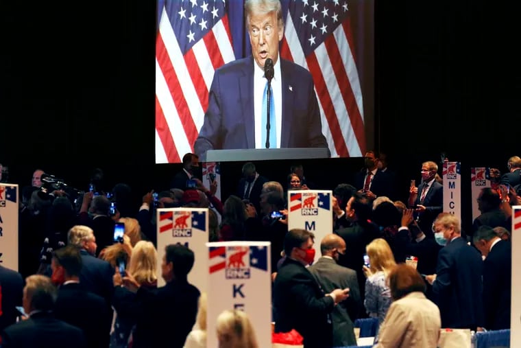 NYTRNC20.Delegates and RNC staff listen as President Trump speaks in the Charlotte Convention Center’s Richardson Ballroom in Charlotte, NC on Monday, August 24.  The delegates have gathered for the roll call vote to renominate Donald J. Trump to be President of the United States and Mike Pence to be Vice President

(Travis Dove for The New York Times).