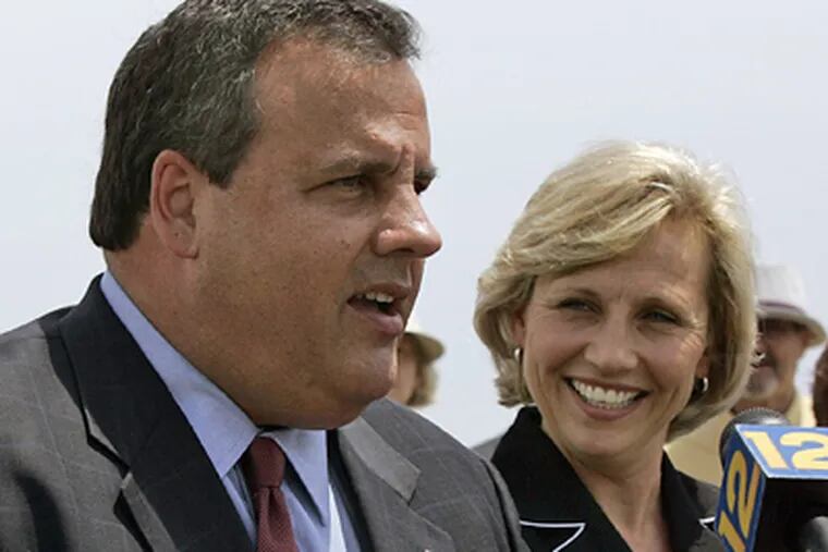 New Jersey Republican gubernatorial candidate Christopher Christie speaks while running mate Kim Guadagno listens during a July 20 press conference. (AP Photo/Mel Evans)