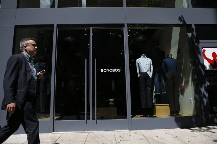 A pedestrian walks by Bonobos at 1519 on Walnut St. in Center City.