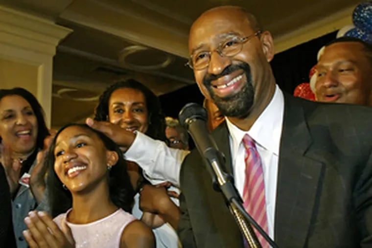 Michael Nutter, shown here at a post-primary celebration with his daughter Olivia and wife Lisa, got lots of small donations.