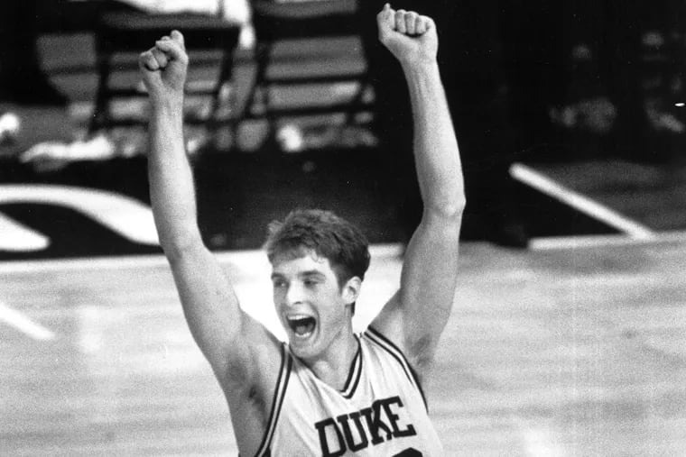 Christian Laettner of Duke celebrates after hitting one of the most famous buzzer beater's of all time to defeat Kentucky 104-103 in overtime during the NCAA tournament East Regional final at the Spectrum in South Philly Mar. 28, 1992.