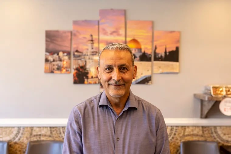 Mohammad Abuhillo, of Somerton, Pa., Non-Profit Executive at Philadelphia Arab American Community Development Corporation, poses for a portrait at Al-Salam Grill in Philadelphia.