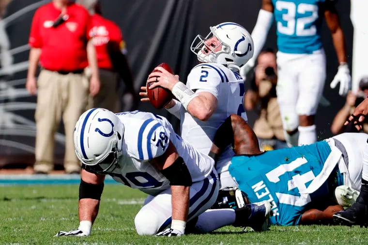 Indianapolis Colts quarterback Carson Wentz (2) during one of the six sacks he took in his worst game of the season, in Jacksonville, which knocked the Colts out of the playoff hunt.
