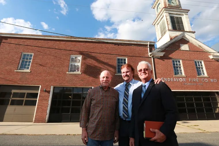 The Endeavor Fire Hall in Burlington City with (from left) Jim Kennedy, redevelopment consultant to the Common Council; Mayor James Fazzone; and David H. Ballard, city business administrator.