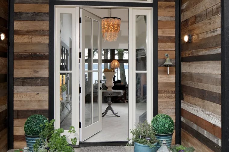 When you have multiple doors to your home, make the front door obvious with plants and a pathway leading to the entryway.