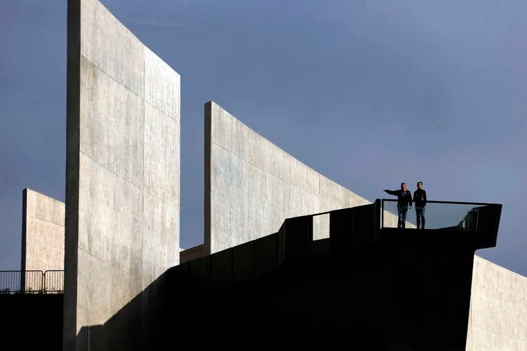 Visitors to the Flight 93 memorial pause on an observation deck before a service of remembrance in Shanksville. Hundreds of victims' relatives were joined by Gov. Wolf and White House officials for the ceremony.